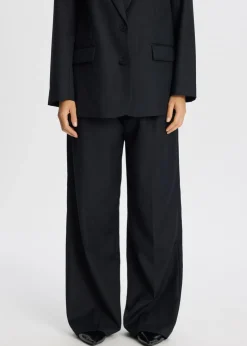 Broek met melange look