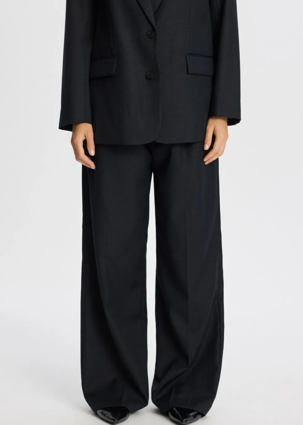 Broek met melange look