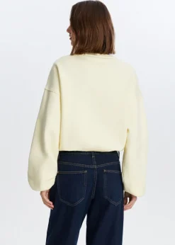 Cropped sweater met print