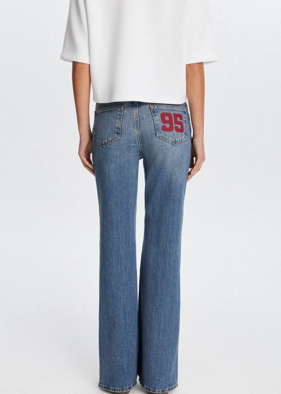 Flared jeans met printdetail