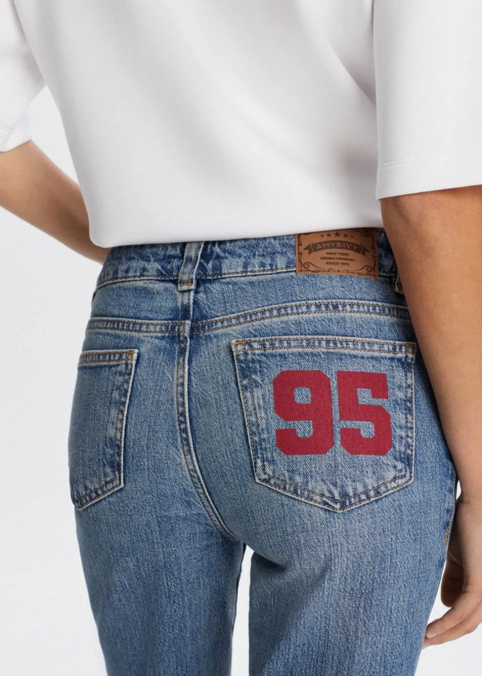 Flared jeans met printdetail