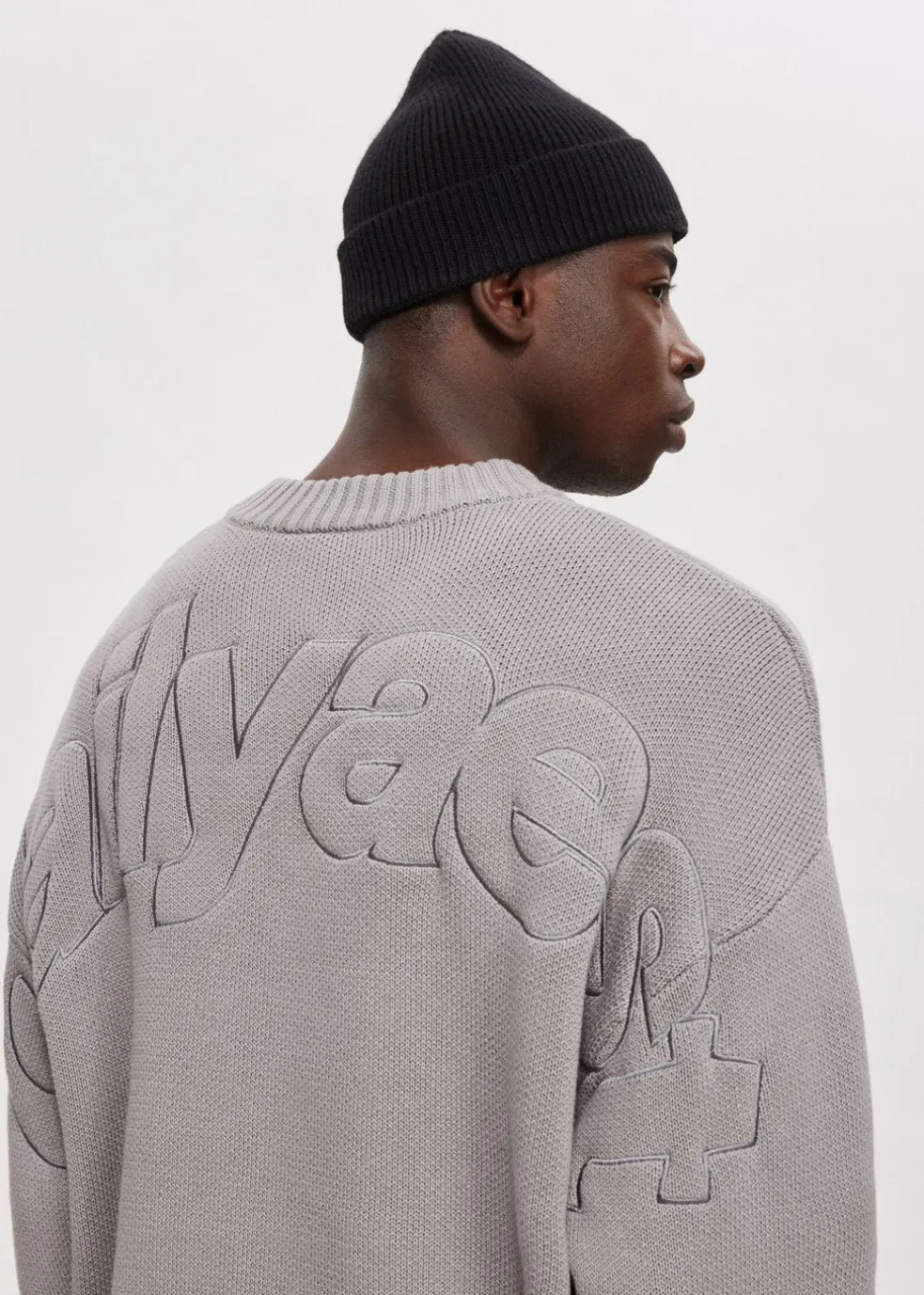 Oversized trui overlap logo