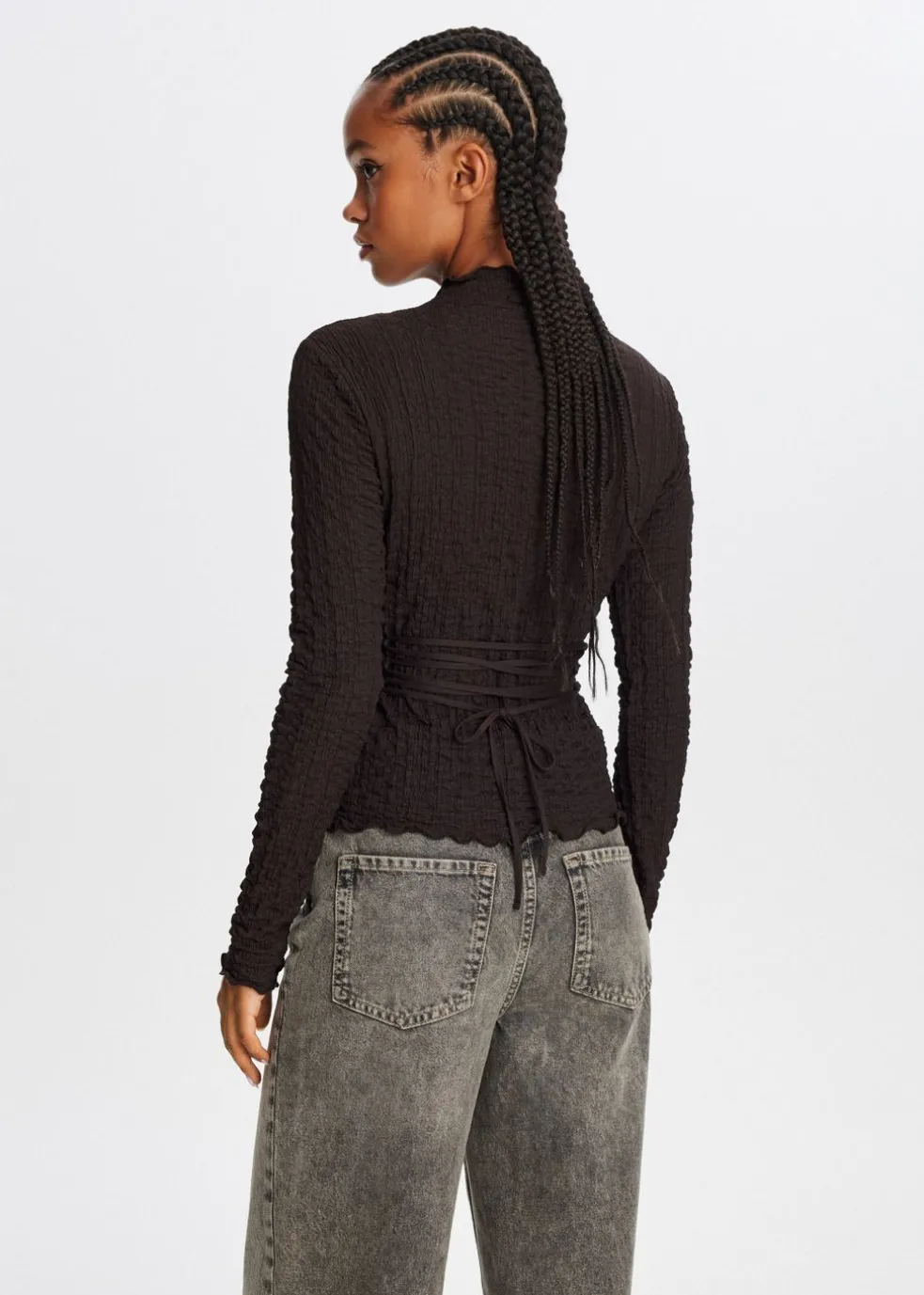 Top met strikdetail