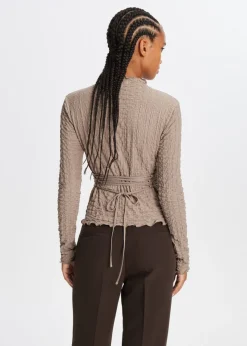 Top met strikdetail