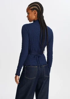Top met strikdetail