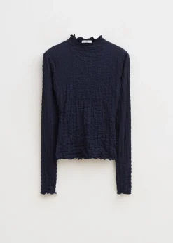 Top met strikdetail