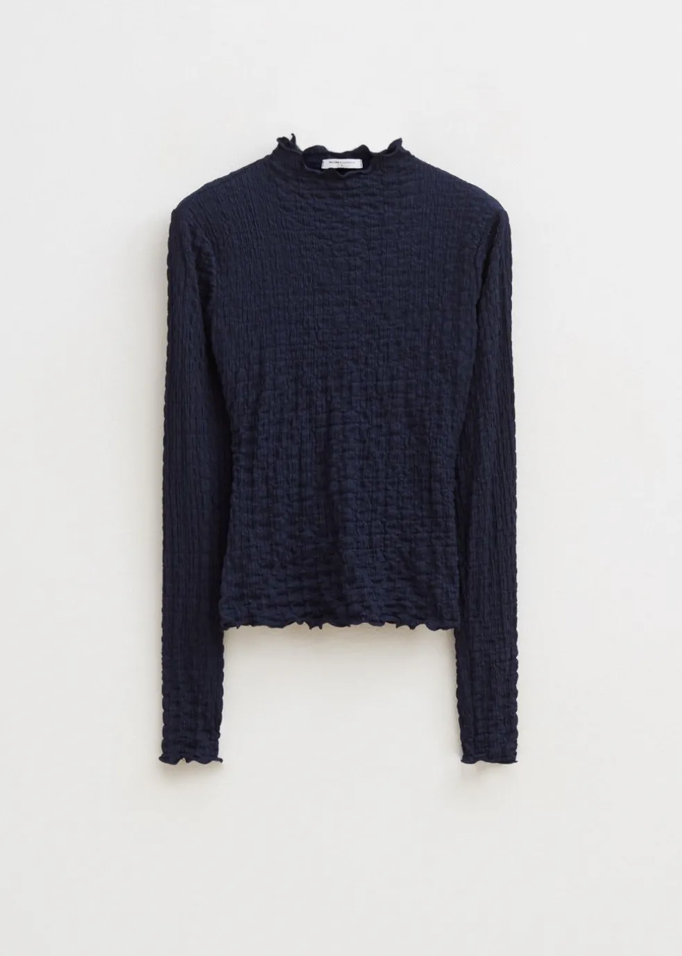 Top met strikdetail
